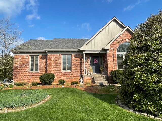 Brick home with new roof installation in Louisville KY