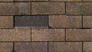 image of a missing roof shingle